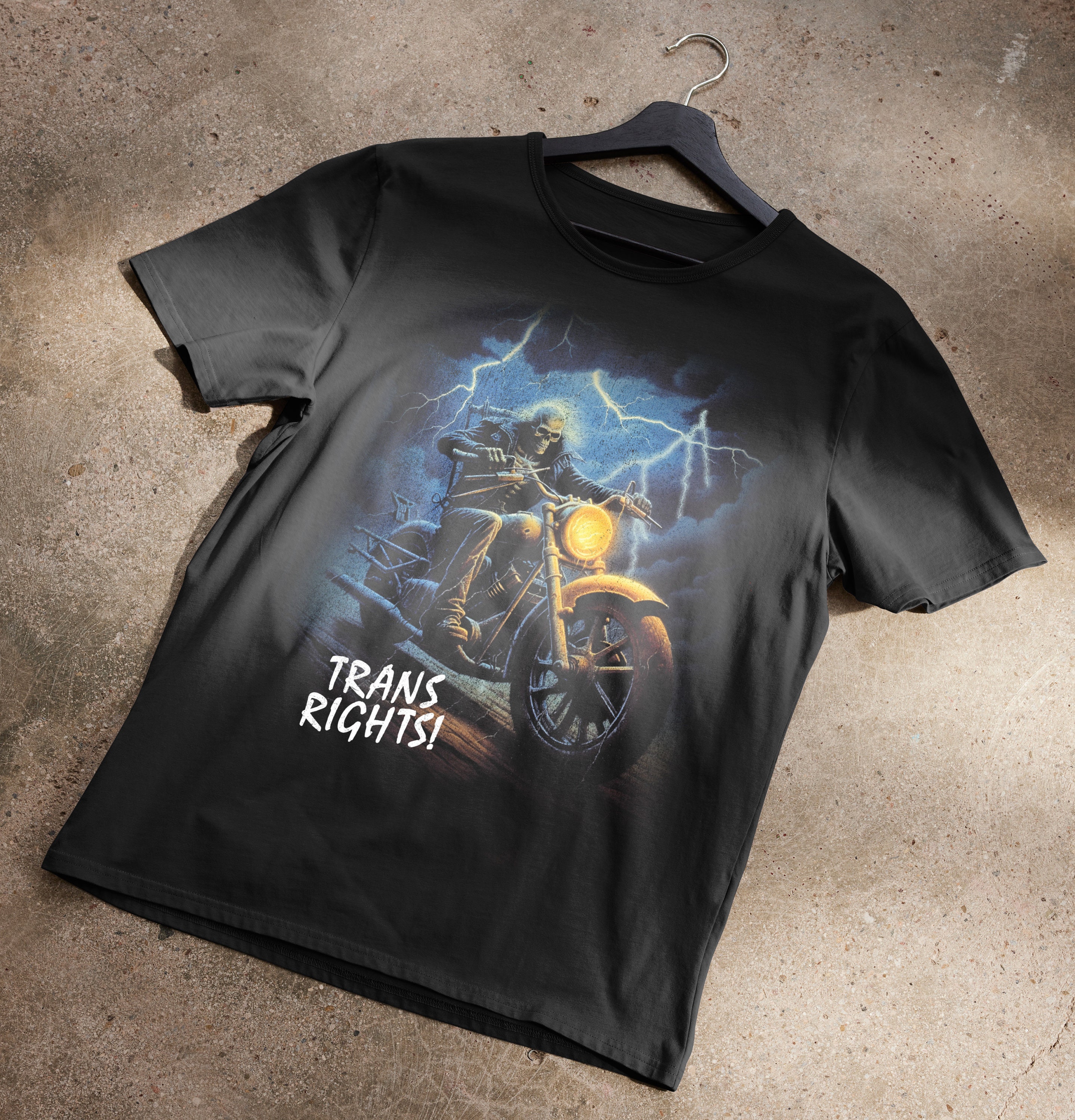 Trans Rights Skeleton Riding A Motorcycle Through Lightning T-Shirt